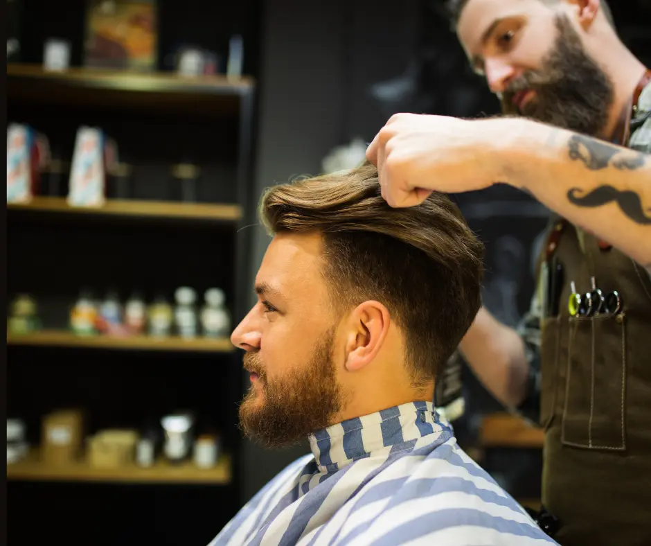 Barber cutting hair