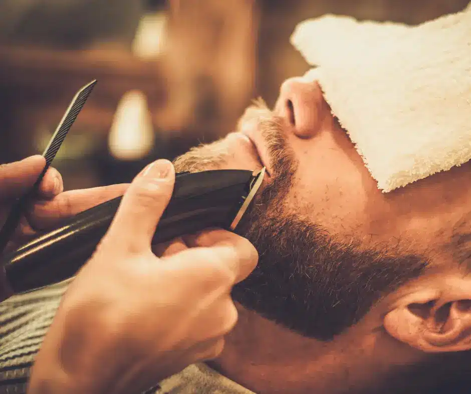 shaving a client bya barber